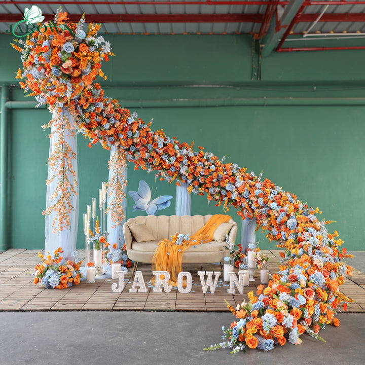 Unusual-Shaped Flower Arch in Orange/Blue