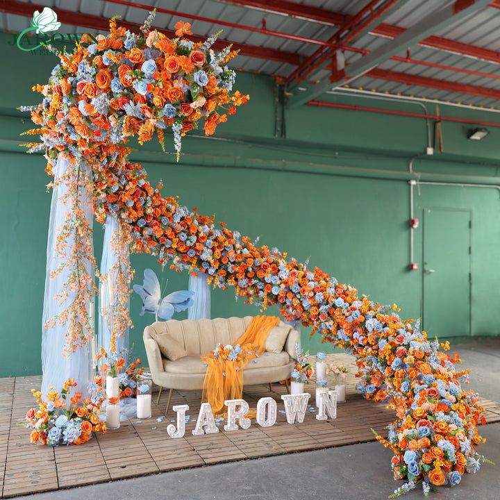Unusual-Shaped Flower Arch in Orange/Blue