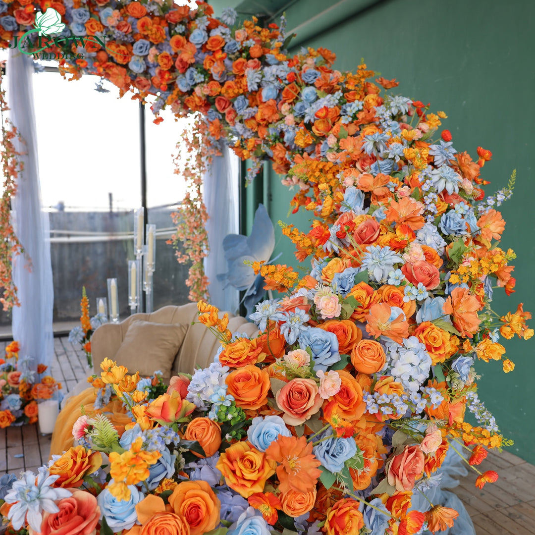 Unusual-Shaped Flower Arch in Orange/Blue